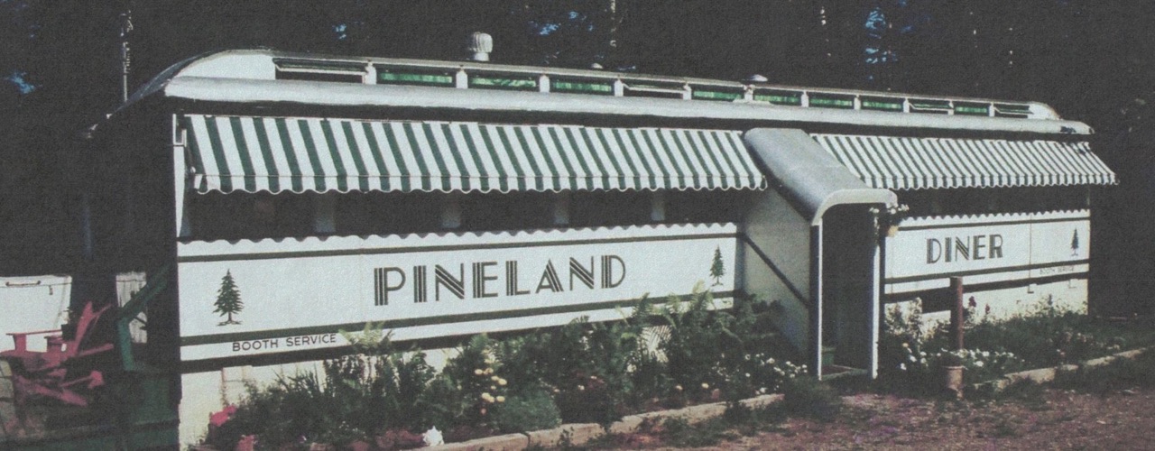 The Pineland Diner in Northport, with striped awnings and PINELAND and DINER lettered along its side